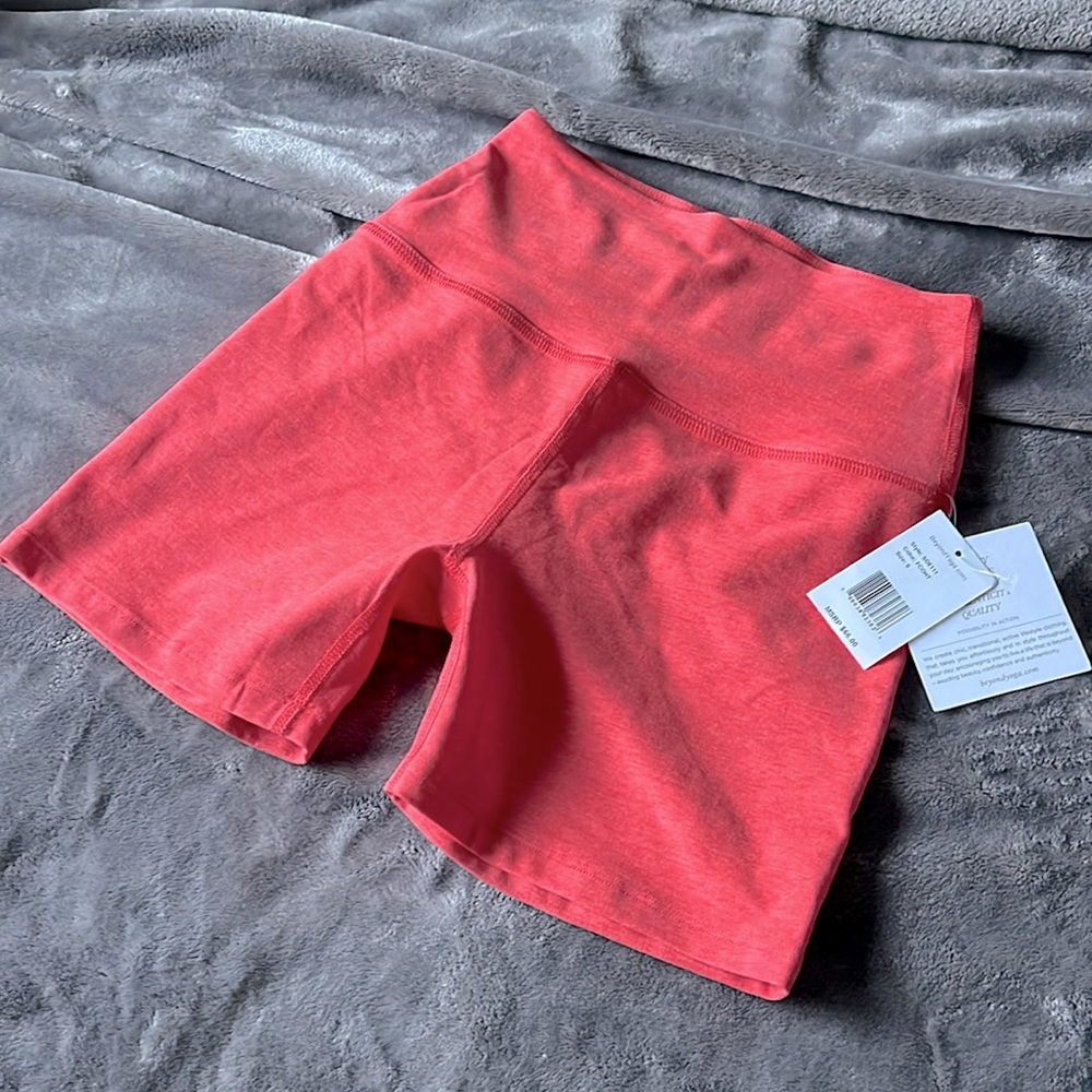 NWOT Beyond Yoga bike shorts coral pink
